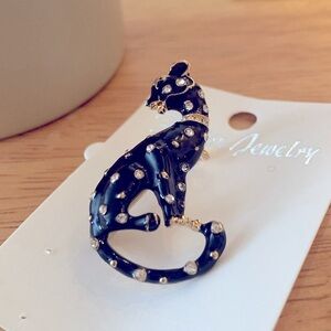 Panther Vintage Style Black and white enamel crystal brooch.
